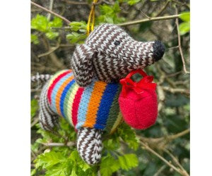 KNITTED SAUSAGE DOG WITH PRESENT CHRISTMAS DECORATION