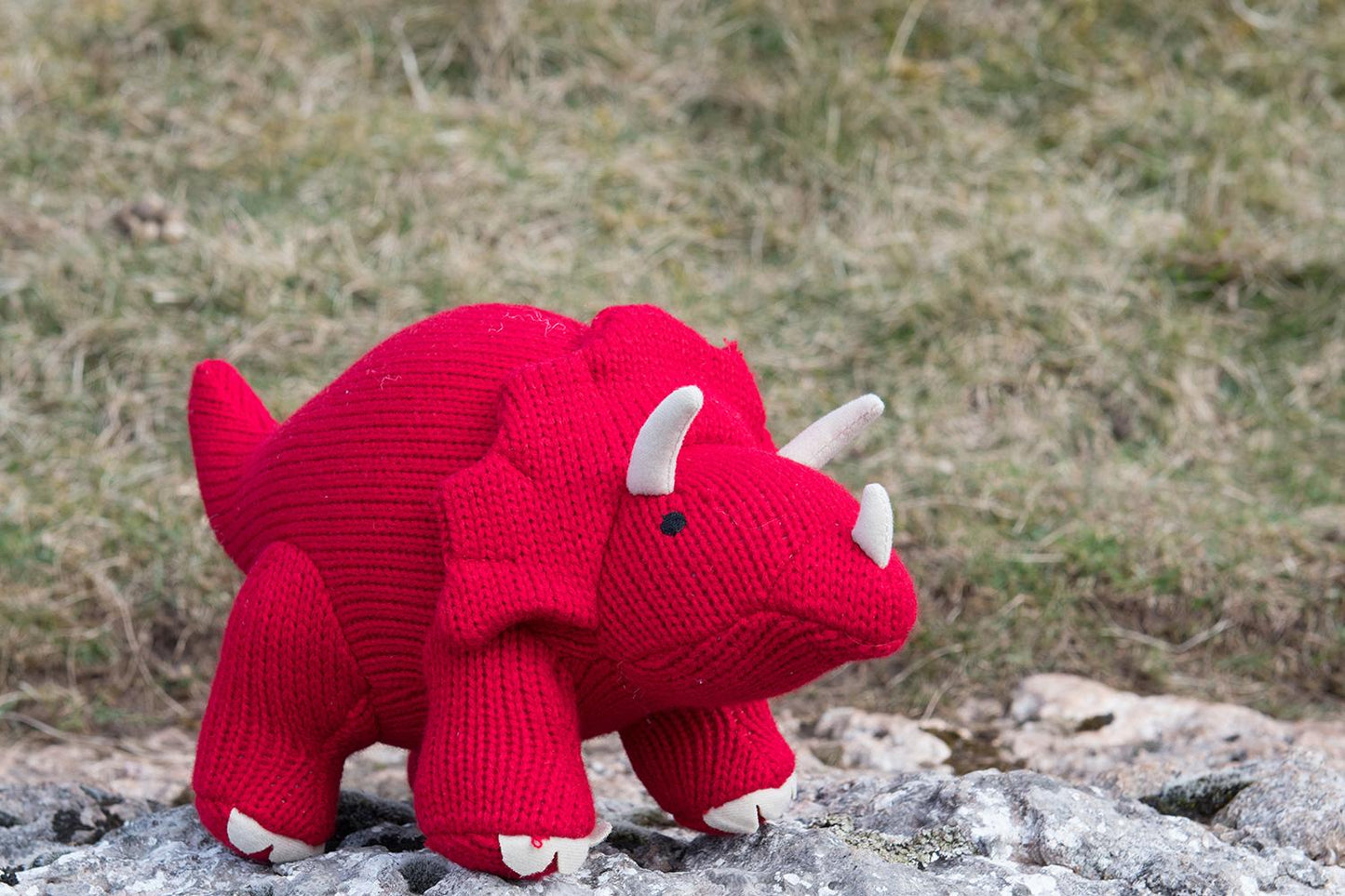 TRICERATOPS KNITTED DINOSAUR SOFT TOY RED