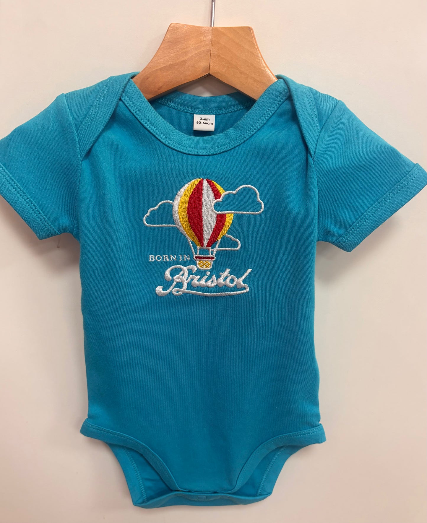 Born In Bristol Bright Blue Hot Air Balloon Bodysuit